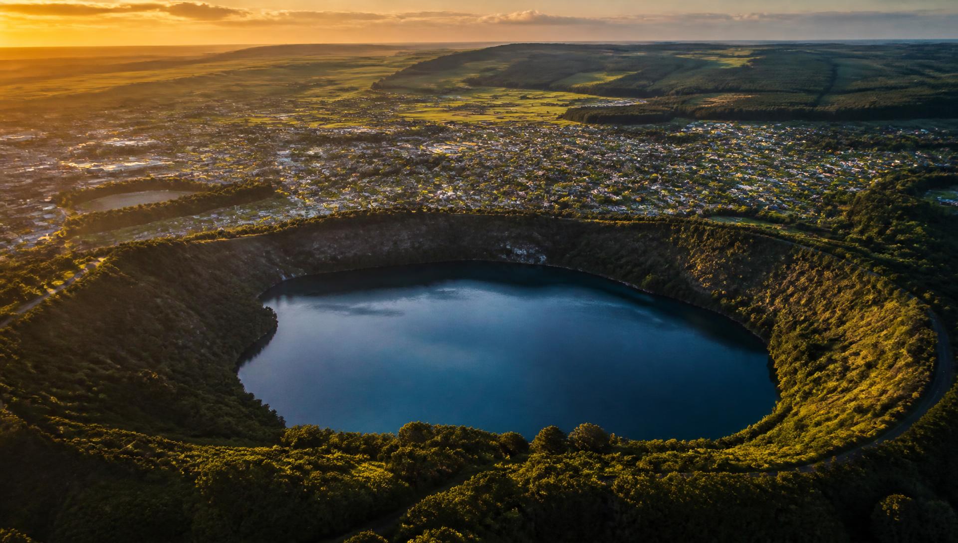 Aerial view of Mount Gambier and the Blue Lake at golden hour